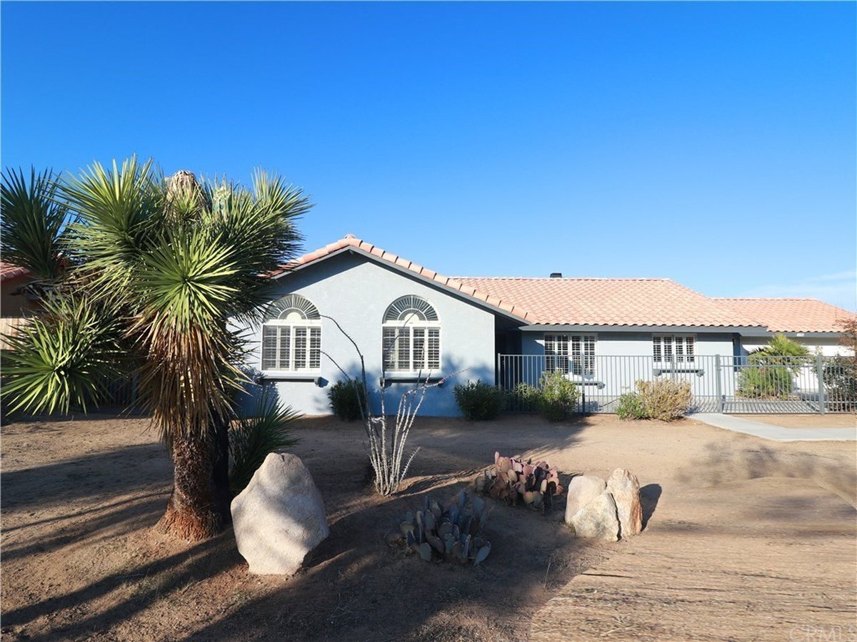 61746 Navajo Trail — restored home exterior with desert landscaping